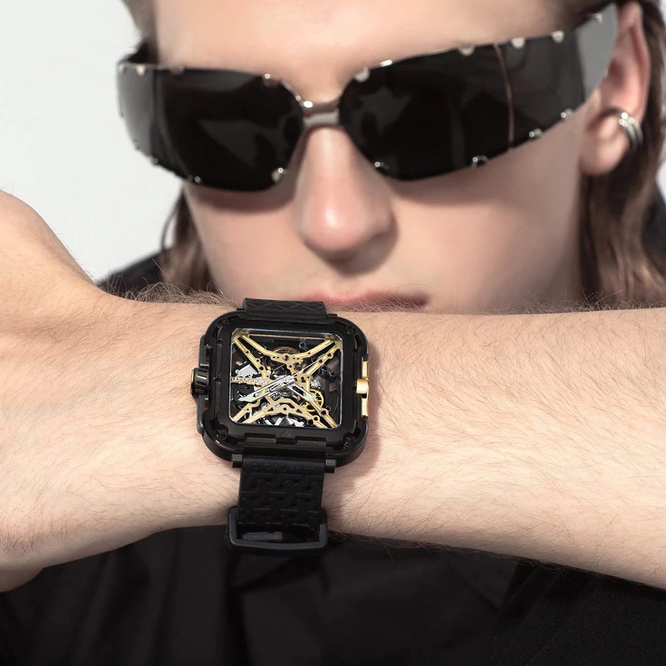 CIGA Design X Series Men's Watch: Titanium Gold Skeleton with Two Straps.