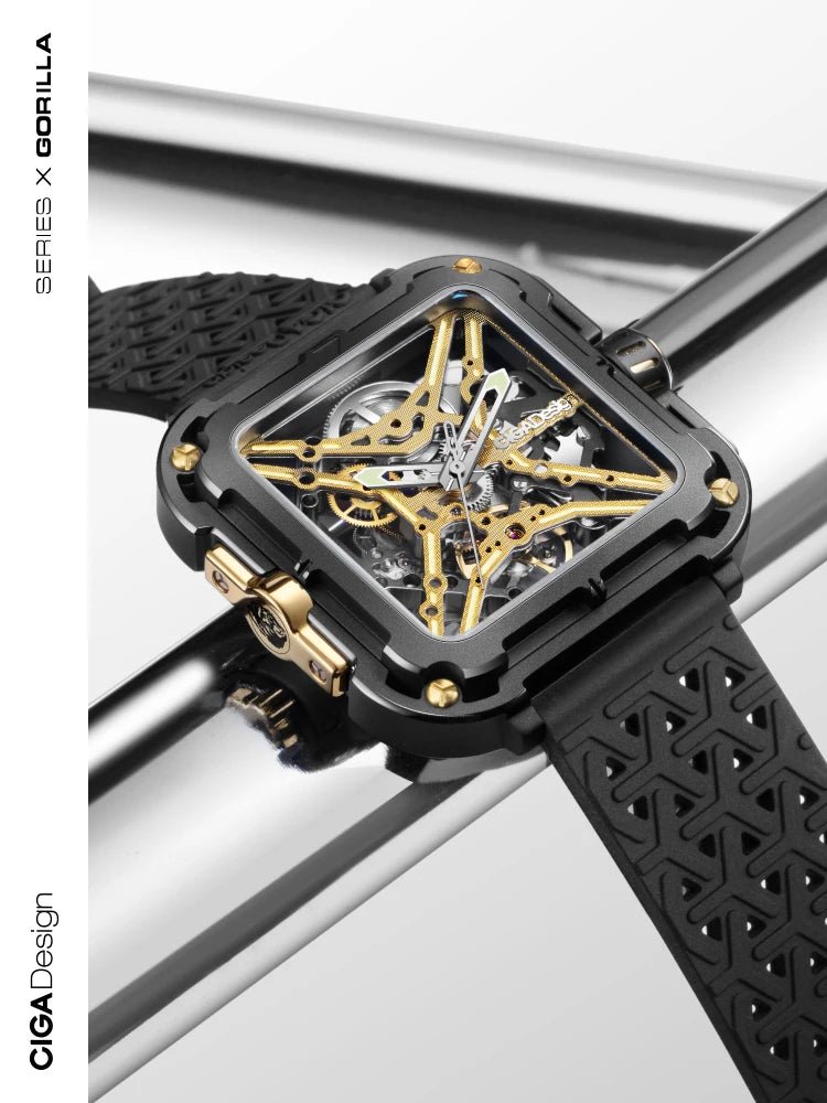 CIGA Design X Series Men's Watch: Titanium Gold Skeleton with Two Straps.